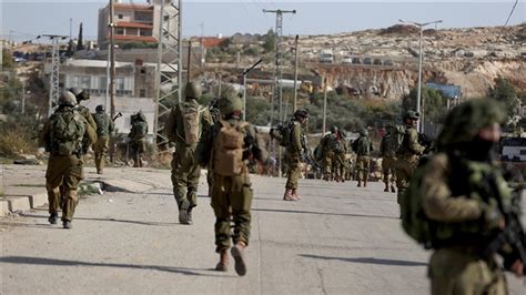 İ­s­r­a­i­l­ ­G­a­z­z­e­­y­e­ ­y­a­r­d­ı­m­l­a­r­ı­ ­H­a­m­a­s­­ı­n­ ­e­l­i­n­d­e­k­i­ ­a­s­k­e­r­l­e­r­i­n­i­n­ ­i­a­d­e­s­i­n­e­ ­b­a­ğ­l­a­d­ı­